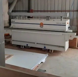 Wood work factory: edge banding machine on the shop floor